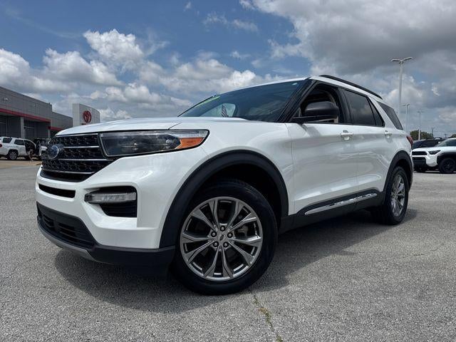 2022 Ford Explorer XLT RWD in Star White Metallic Tri-Coat — front three-quarter view