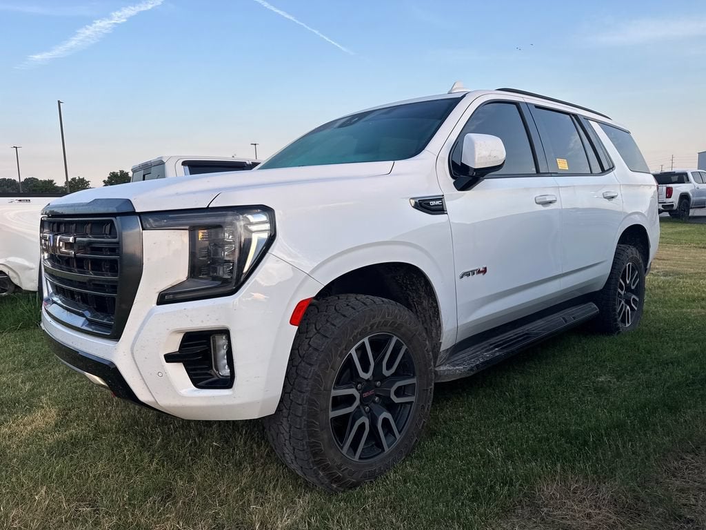2023 GMC Yukon AT4 in Summit White — front three-quarter view