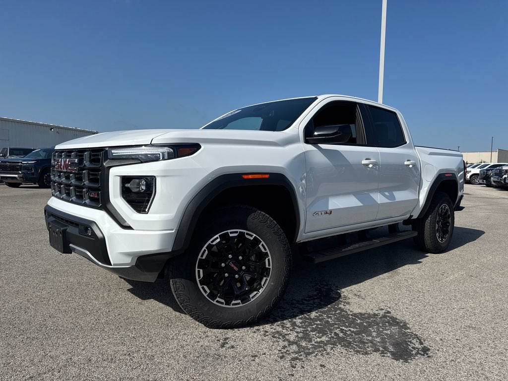 2026 GMC Canyon AT4 in Summit White — front three-quarter view