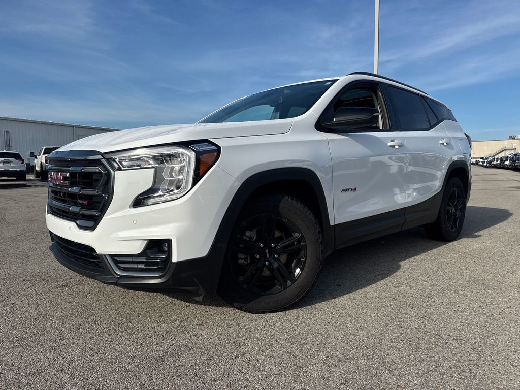 2024 GMC Terrain AT4 in Summit White — front three-quarter view