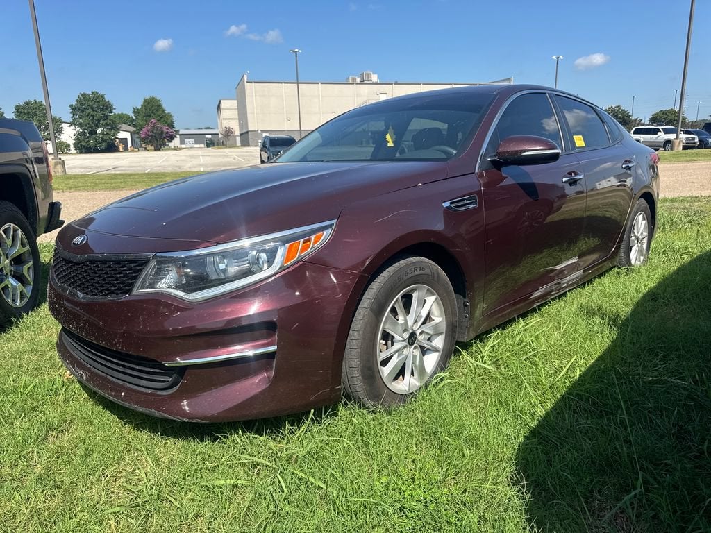 2016 Kia Optima LX in Sangria — front three-quarter view