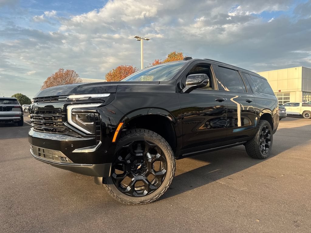 2026 Chevrolet Suburban RST in Black — front three-quarter view