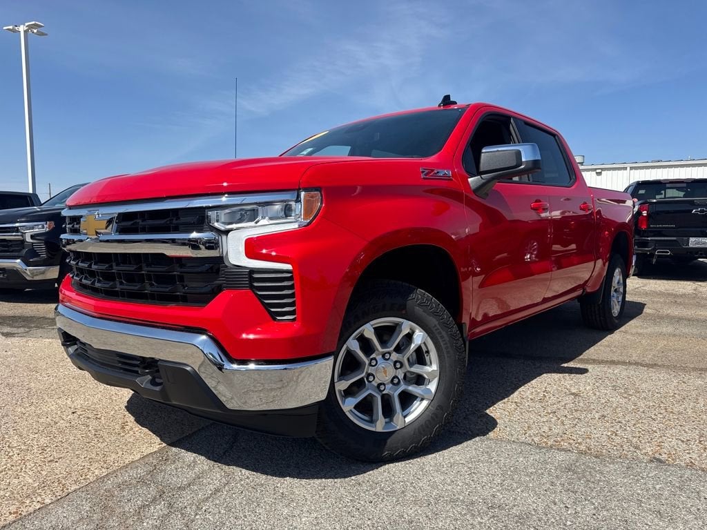 2026 Chevrolet Silverado 1500 LT in Red Hot — front three-quarter view