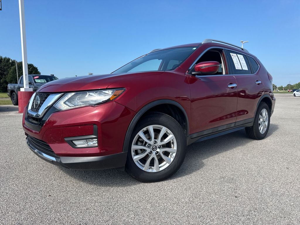 2018 Nissan Rogue SV in Scarlet — front three-quarter view
